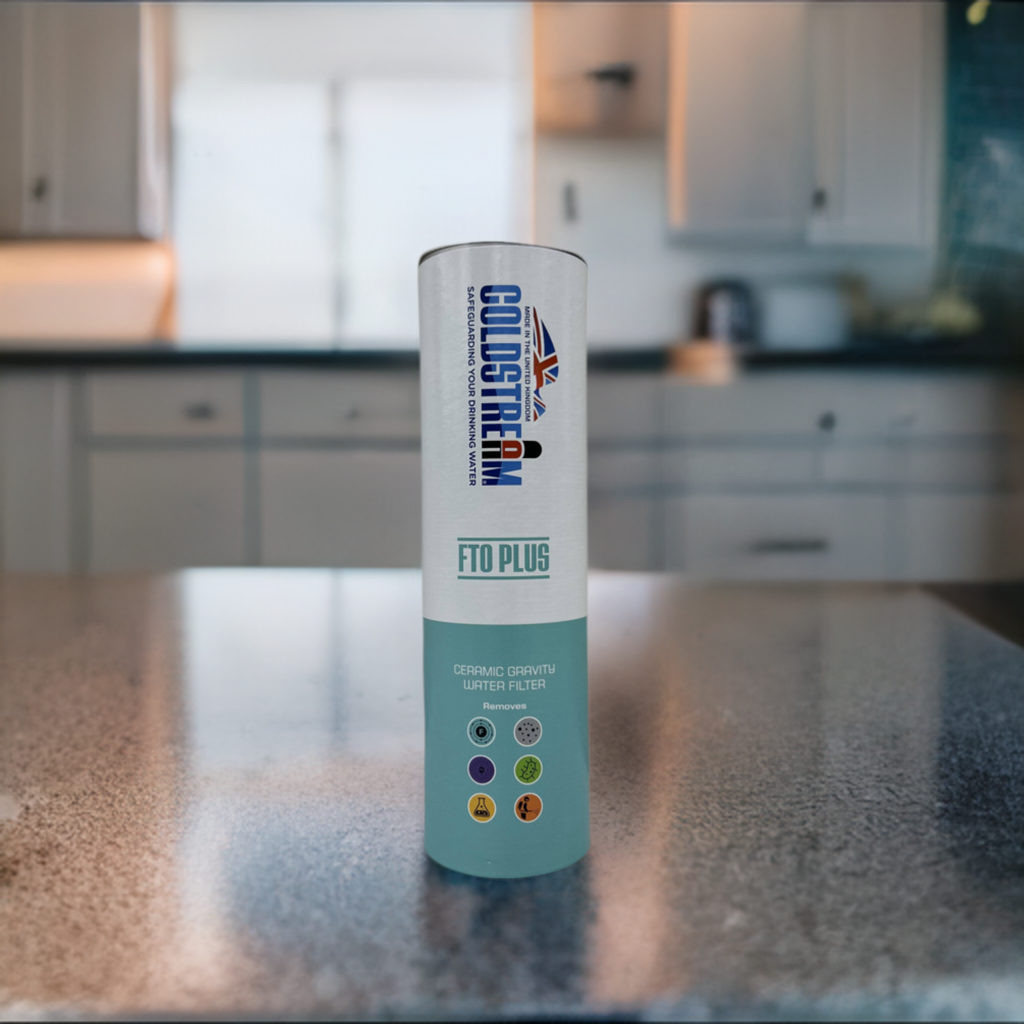 53475554137_db69503ec3_o - Business Connect World RSA Ceramic gravity water filter bottle on a kitchen counter labeled FTO PLUS with feature icons.